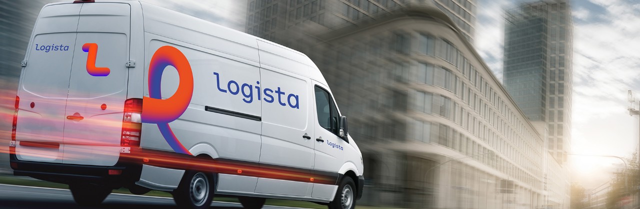 Logista Freight van driving through city streets